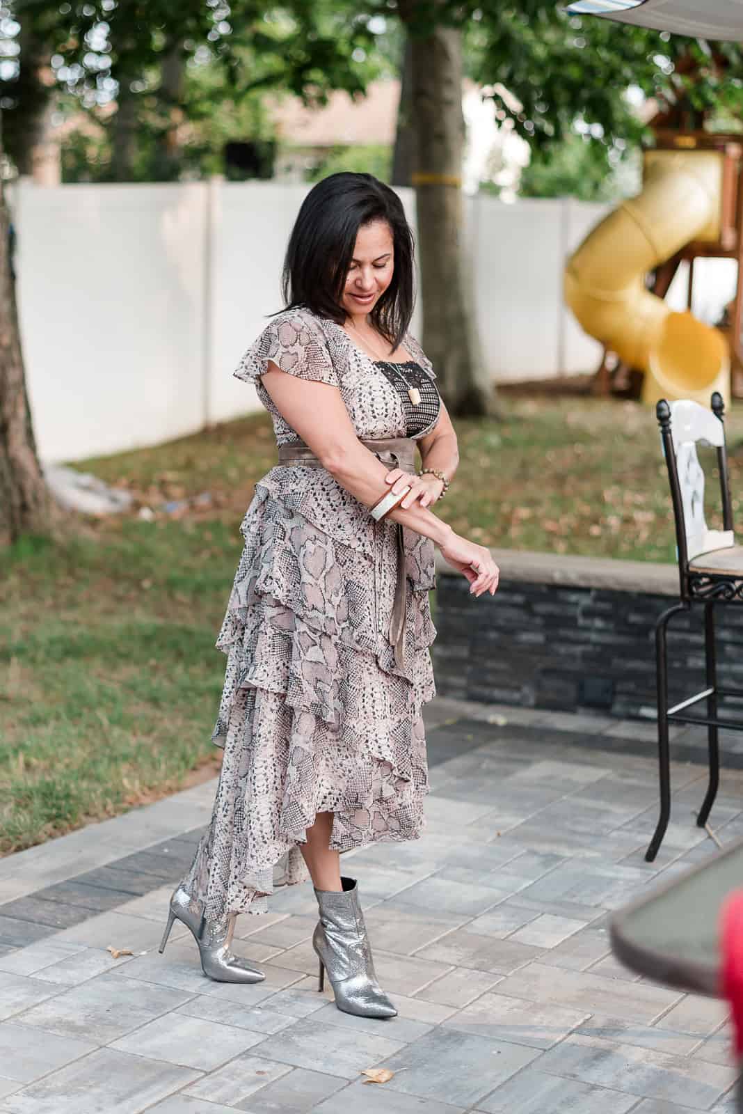 I got this ruffle dress last year at Anthropologie, during their fall sale. The boots I got two years ago, and I already styled it here with a black dress. And, the jewelry is my creation, so it's from Vidart & Life Boutique.