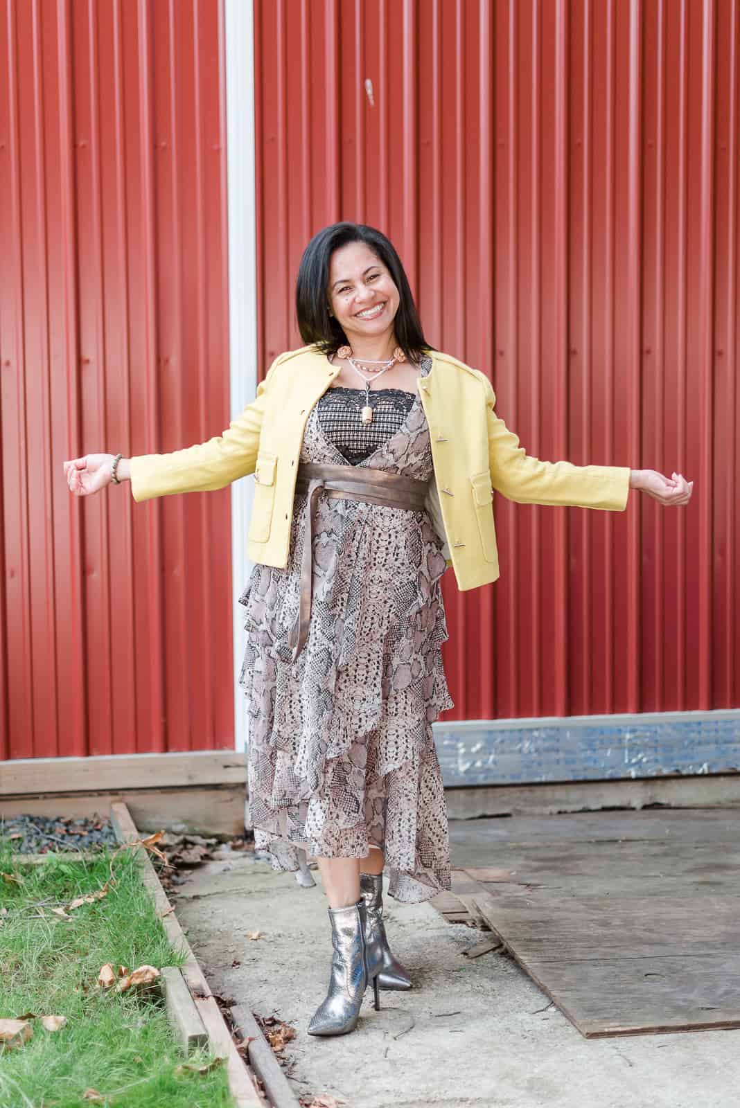 This look has everything I like. All together — high-low-cut dress cover with ruffles, snake print, unique jewelry, wide belt, shine boots, and a yellow jacket.